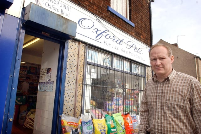 Michael McKie stops selling birds in his shop in 2005.