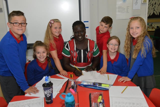 Daniel Fletcher, Faith Evans, Macey Fleetham-Reid, Stephen Phillips, Lucie Griffith and Sienna Williams are visited by Kenyan headteacher, Judith Mutange, in 2015.