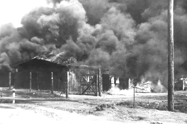 The burning of huts at Belsen.