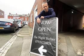 Barber Al Devon outside of his Tees Street shop, The Night Barber.