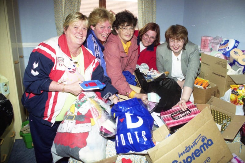 There were huge levels of donations for the refugees of Kosovo after an appeal in Sunderland in 1999. Sorting through it all was (left to right) Town End Farm residents Betty Tomlinson, Jackie McDermont, Jan Bramham, Mervian Coulson and regional manager Wendy Conn.