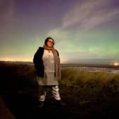 Edward Martin's girlfriend Sarah against the backdrop of the Northern Lights on Saturday night.
