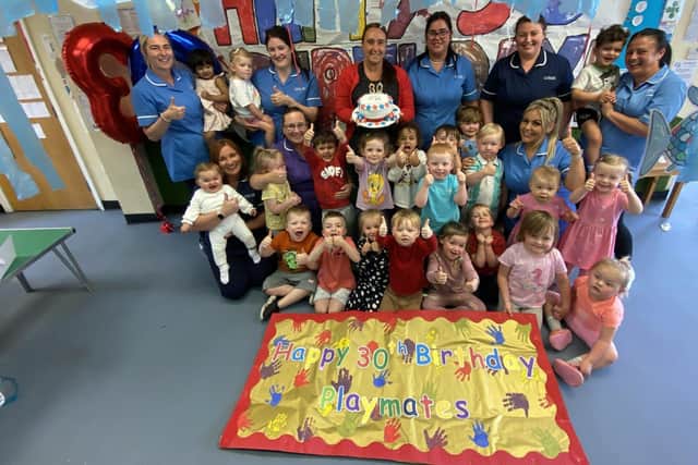 Staff and children at Playmates Private Day Nursery celebrate their 30th birthday.