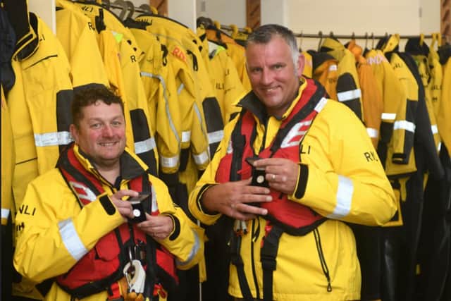 Eddie Mason (left) and Rob Archer with their RNLI 20-year long service awards. Picture Tom Collins.
