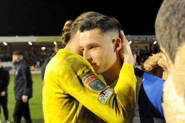 Ben Killip consoles Luke Molyneux after Hartlepool United's penalty shootout defeat. 09-03-2022. Picture by FRANK REID