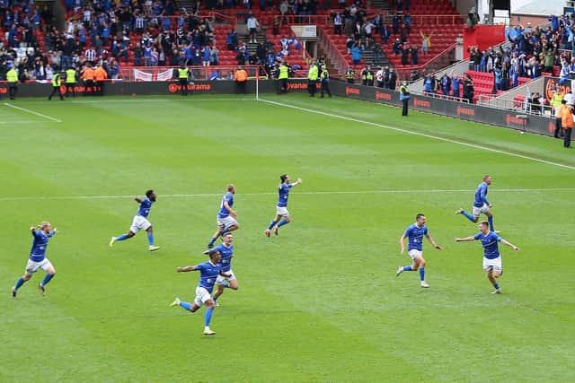 Hartlepool United players celebrate after winning the shoot-out and promotion after the Vanarama National League play-off final at Ashton Gate, Bristol.