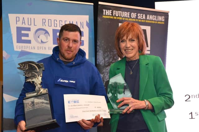 Scott Pippen Moore is presented with his trophy and cheque for £4,000 from Councillor Jane Evison for being Overall Winner in the 2023 Paul Roggeman European Beach Championships.