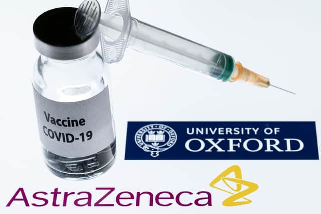 Illustration showing a syringe and a bottle reading "Covid-19 Vaccine" next to AstraZeneca company and University of Oxford logos. (Photo by JOEL SAGET / AFP) (Photo by JOEL SAGET/AFP via Getty Images)