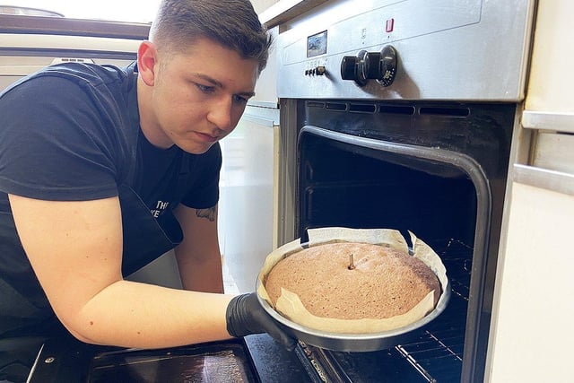 Hartlepool baker Josh Newton created a host of stunning decorated cakes for special occasions under the name Cake King. Here is taking a cake from the oven in 2020. Picture by FRANK REID
