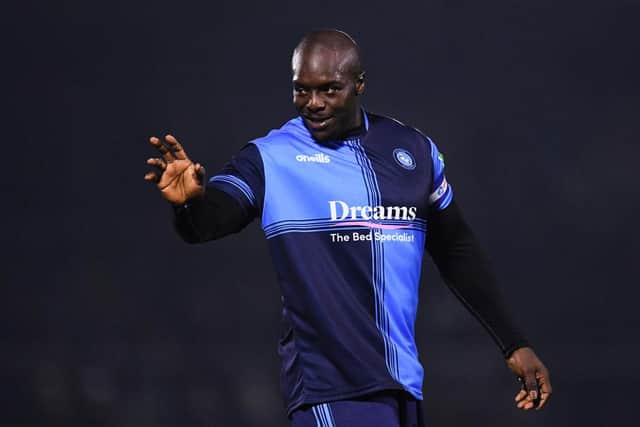 Adebayo Akinfenwa of Wycombe Wanderers reacts during the Emirates FA Cup First Round Replay match between Wycombe Wanderers and Hartlepool United at Adams Park on November 16, 2021 in High Wycombe, England. (Photo by Alex Burstow/Getty Images)