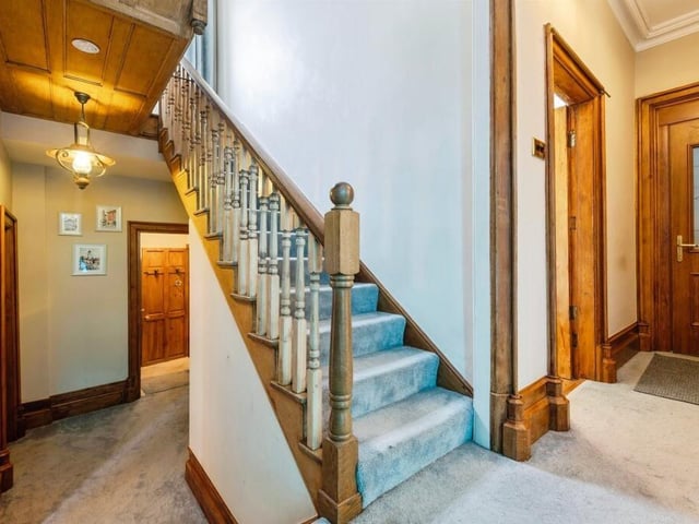 This cosy entrance hall has doors leading to all ground floor rooms and stairs up to the first floor.