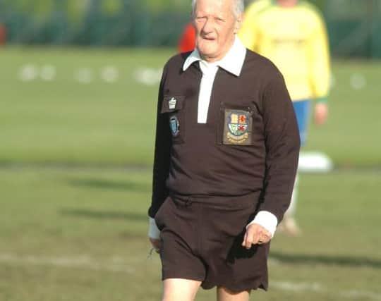 Decades of dedication were shown by Tom Harvey as he helped officiate games.