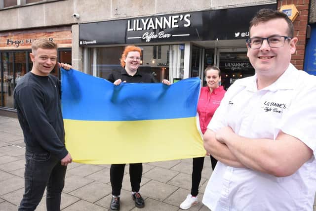 Trevor Sherwood (front right) project development manager at LilyAnne's Coffee Bar along with baristas Elijah Hunnisett and Iggy Anderson and commuity co-ordinator Angela Arnold prepare to welcome Ukrianian refugees.