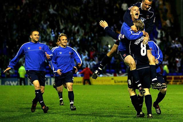 Ritchie Humphreys of Hartlepool United celebrates with his team after winning the  League One semi-final, second leg play-off match between Tranmere Rovers and Hartlepool United at Prenton Park on May 17, 2005 in Tranmere, England. (Photo by Bryn Lennon/Getty Images)