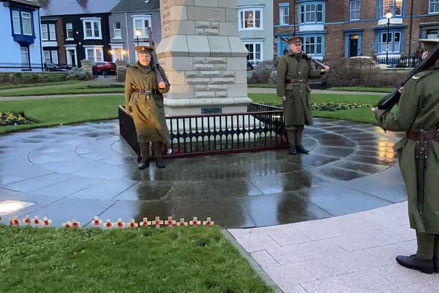 Members of the Durham Light Infantry, 18th Battalion (Durham Pals) at the Redheugh Gardens War Memorial during the 2020 closed service. Picture by Frank Reid.