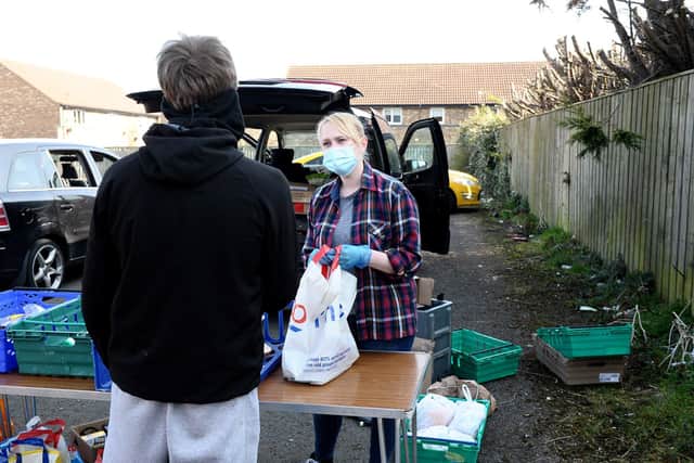 Jen Elliott from Poolie Time Exchange helps out at St Aidan's Kitchen in the church car park. Picture by FRANK REID