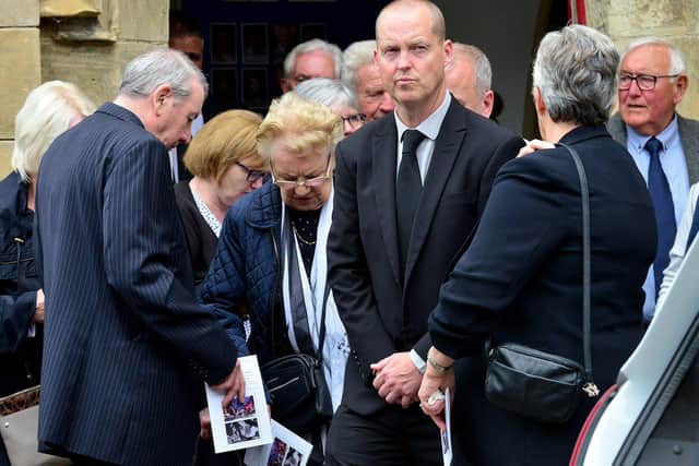 Mourners make their way from Holy Trinity Church, Seaton Carew, after the funeral service for former Hartlepool United player Hughie Hamilton. Picture by FRANk REID