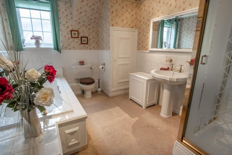 The family bathroom offers a walk-in shower. There is also an en-suite WC and ground floor WC.