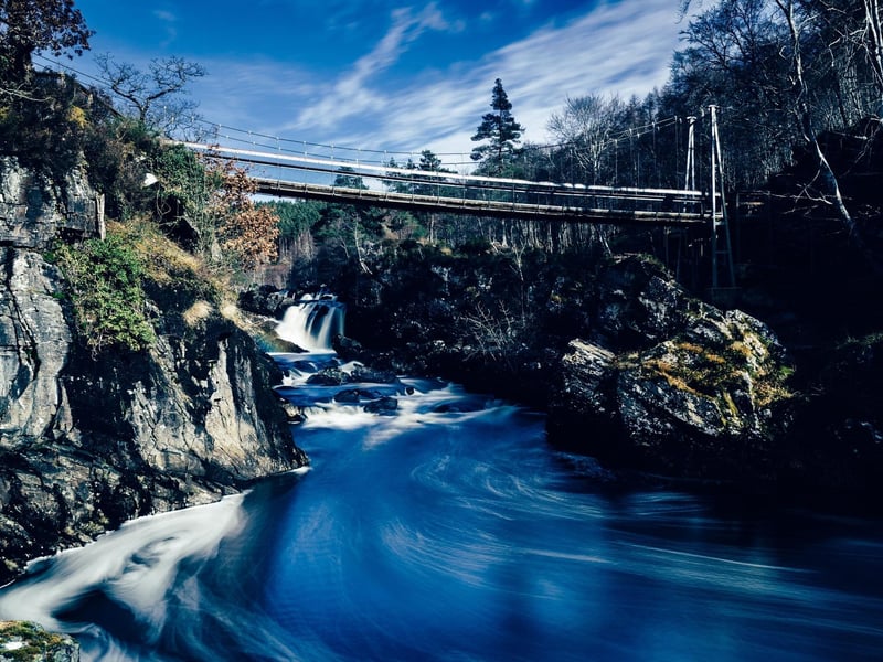 Located north of Inverness, near Strathpeffer, Contin Forest offers peaceful birch, pine and spruce woodland walks. A reward for making it to the far north of the forest are the impressive cascades of Rogie Falls that can be viewed from a bridge over the Black Water River.