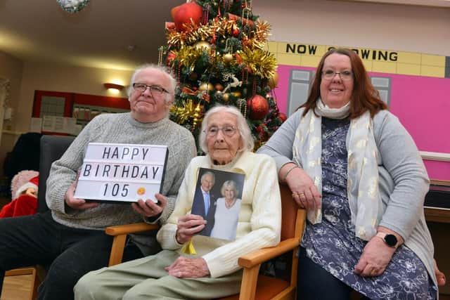 Maisie Rymer celebrates her 105th birthday with son, Christoper Rymer, and daughter-in-law, Sharon Rymer.
