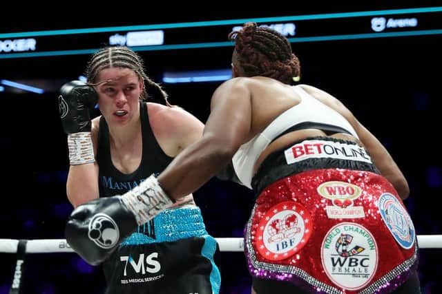 MANCHESTER, ENGLAND - JULY 01: Savannah Marshall punches Franchon Crews-Dezurn during the IBF, WBA, WBC, WBO World Super Middleweight Title fight between Savannah Marshall and Franchon Crews-Dezurnat AO Arena on July 01, 2023 in Manchester, England. (Photo by Charlotte Tattersall/Getty Images)