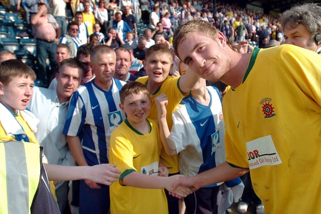 Midfield player Gary Liddle with Hartlepool United fans at Adams Park.