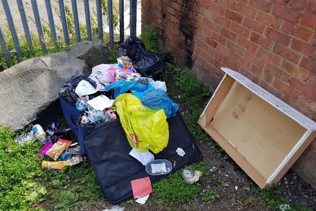 Suitcases filled with children's toys and household waste was among the dumped rubbish.