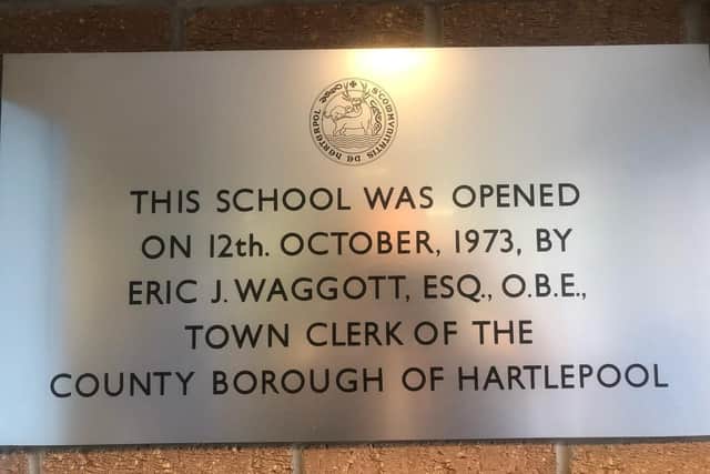 A school plaque marking the school's opening back in 1973.