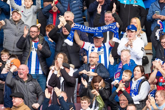 Hartlepool United fans celebrate Daniel Kemp scoring a goal with team-mates during the Sky Bet League 2 match between Bradford City and Hartlepool United at the University of Bradford Stadium on 18th March 2023.