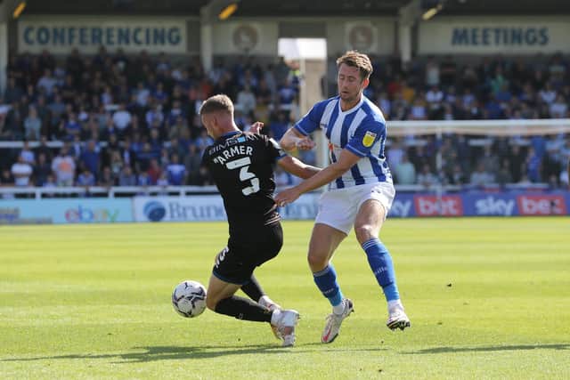 Neill Byrne of Hartlepool United in action with Carlisle United's Jack Armer  during the Sky Bet League 2 match between Hartlepool United and Carlisle United at Victoria Park, Hartlepool on Saturday 28th August 2021. (Credit: Mark Fletcher | MI News)