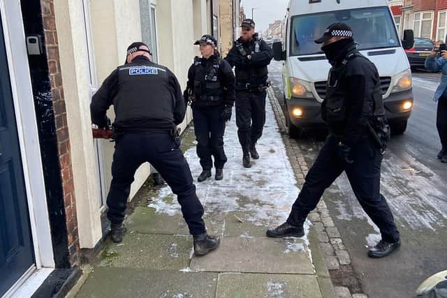 Police officers carrying out a drugs raid at an address in Cornwall Street, Hartlepool. Picture by FRANK REID