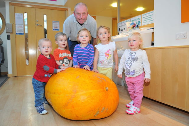 Keith Davison was pictured with his giant pumpkin and with children at Wingate Sure Start Centre in 2013. The children are (left to right) Quade Charlton, James Box, Eliza Dixon, Libby Harris and Freya Gourley.