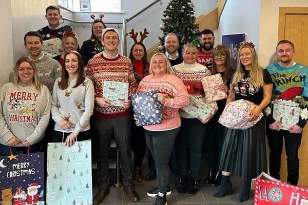 Miller Homes employees pictured with the gifts for NHS North Tees & Hartlepool NHS Foundation Trust.