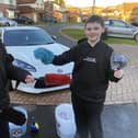 Cole Jobling (left) and Joel Hogg all set to wash a car after setting up their car detailing business.