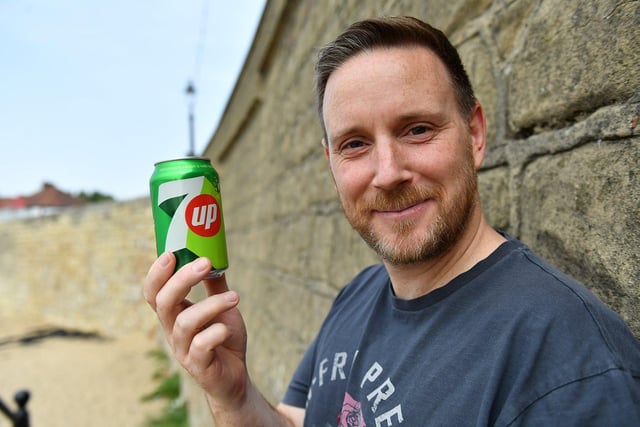 Jon Leece keeps cool with a can of pop at the Headland.