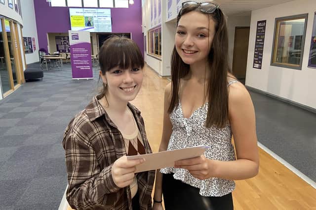 Amelia Weldrake (left) and Hollie Riley-Wilson (right) collect their GCSE results from Dyke House Sports and Technology College.