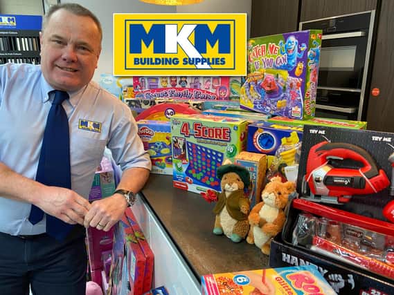 MKM's Mick Sumpter with some of the donated toys.