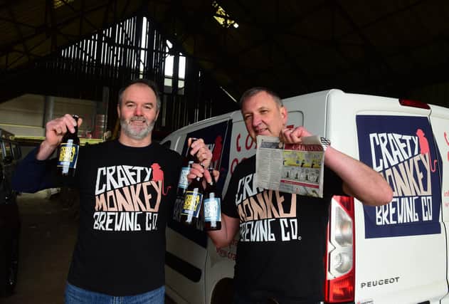Pat Garrett (left) and Gary Olvanhill of The Crafty Monkey Brewing Company delighted that their company was mentioned in the Andy Capp cartoon in the Daily Mirror recently.