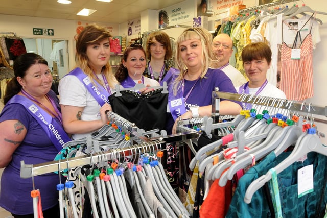 Dean Road Children's Society charity shop manager Carole Collins (front middle) with volunteers 9 years ago.