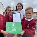 West View Primary school pupils Amelia Pearson, Tommy Wilson, Leo Robinson and Eva Armes with the school's Eco award certificate and  plaque./Photo: Frank Reid