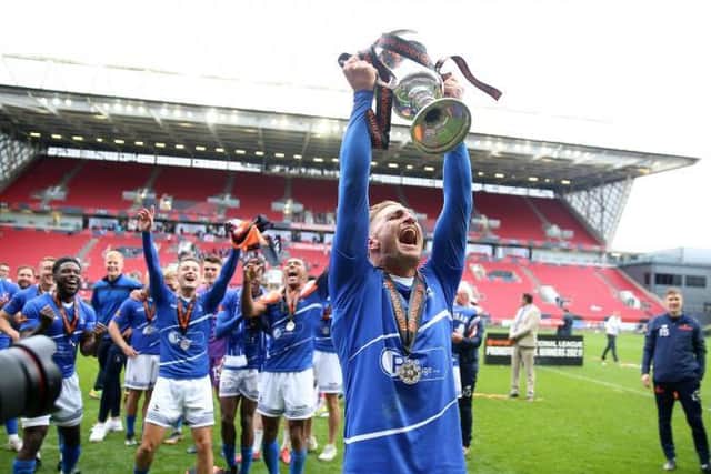 Gary Liddle lifting the National League promotion final trophy (photo: PA)