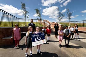 David Sharpe, sales advisor at Bellway’s Regency Manor development, with staff and students from Wynyard C of E Primary School, who have received a £500 donation from the housebuilder to plant new trees at the school.