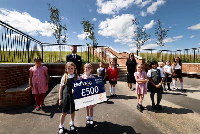 David Sharpe, sales advisor at Bellway’s Regency Manor development, with staff and students from Wynyard C of E Primary School, who have received a £500 donation from the housebuilder to plant new trees at the school.