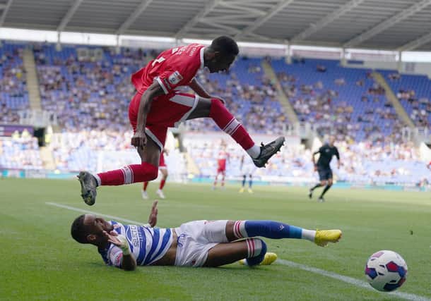 Reading's Tom Ince and Middlesbrough's Isaiah Jones during the Sky Bet Championship match at Select Car Leasing Stadium, Reading. PA.