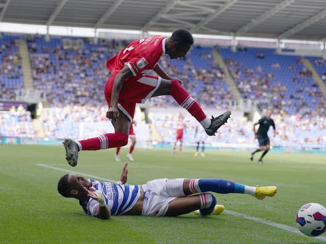 Reading's Tom Ince and Middlesbrough's Isaiah Jones during the Sky Bet Championship match at Select Car Leasing Stadium, Reading. PA.