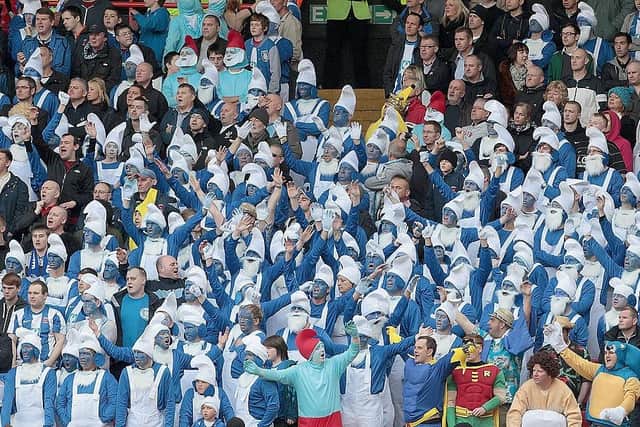 Hartlepool United fans dress up as smurfs during the League One match between Charlton Athletic and Hartlepool United at The Valley on May 5, 2012.  (Photo by Phil Cole/Getty Images)
