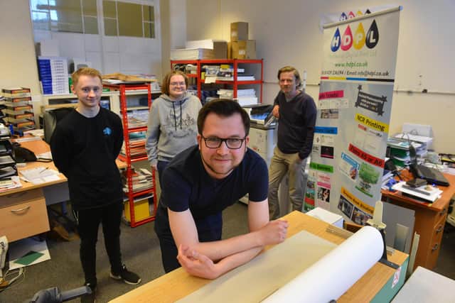 Hartlepool Digital Printing are taking part in the Sir Captain Tom Moore 100 Challenge. Front, Andrew Saint and, back from left, Kenny Doherty, Rachel Cryer and director Paul Cryer.