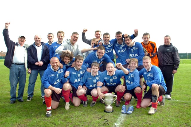 The Hourglass football team celebrate winning the Bob Waller Cup in 2008.