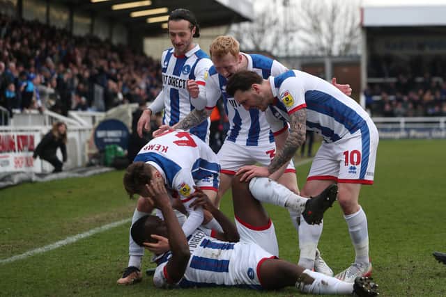 Hartlepool United players celebrate the opening goal at the Suit Direct Stadium against Northmpton Town. (Photo: Mark Fletcher | MI News)