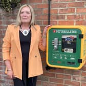 Pam Shurmer with a community access defibrillator in Hartlepool. (Photo: Pam Shurmer/PA Wire)